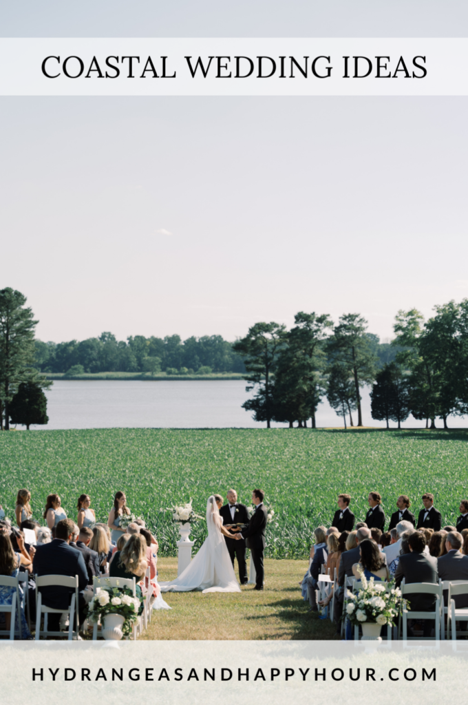 Image of a wedding ceremony with water and cornfield in the background. 